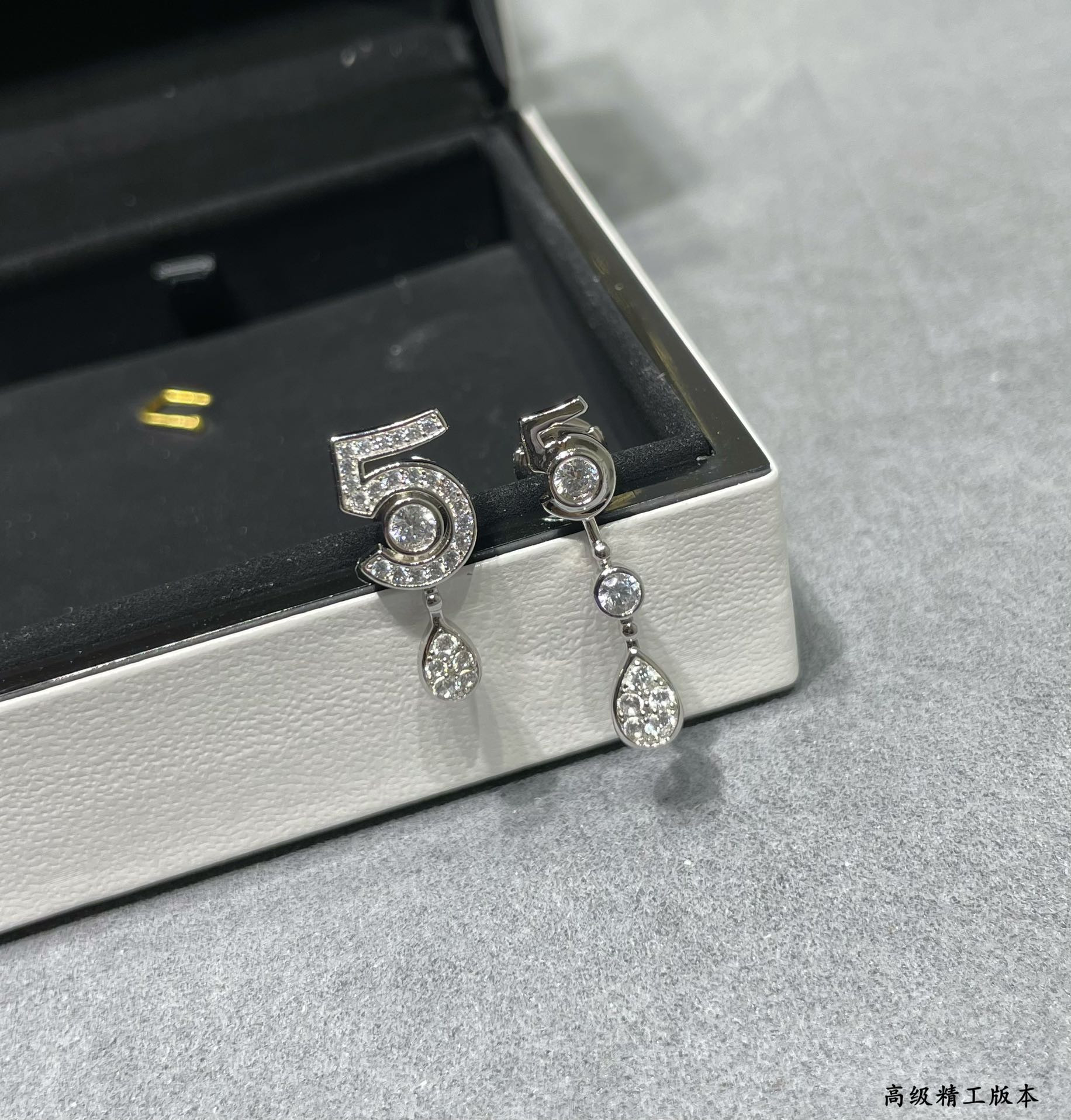 Chanel 5-word Earrings