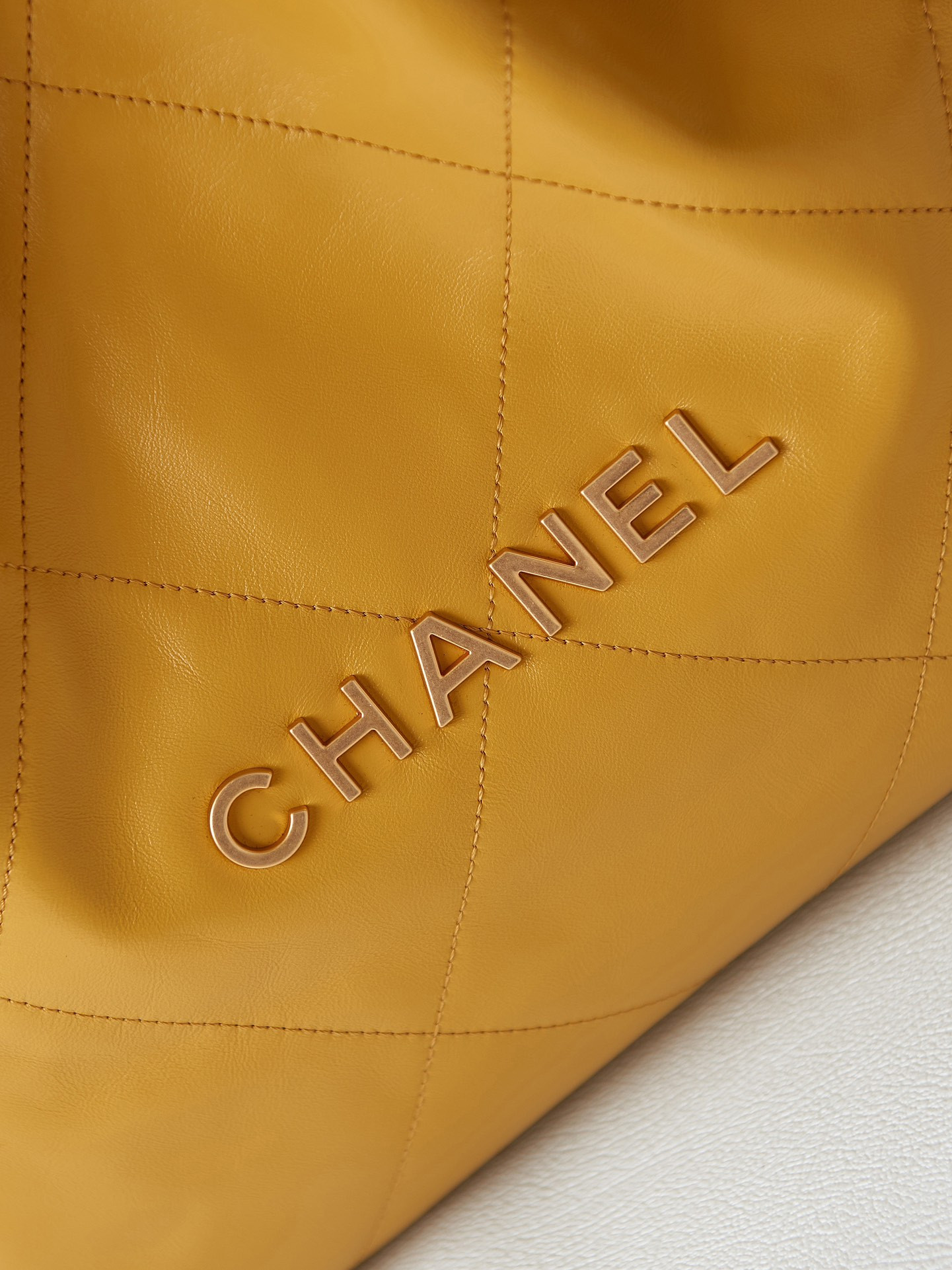 CHANEL 22 SMALL HANDBAG Shiny Calfskin YELLOW 13.7×14.4×2.7 in