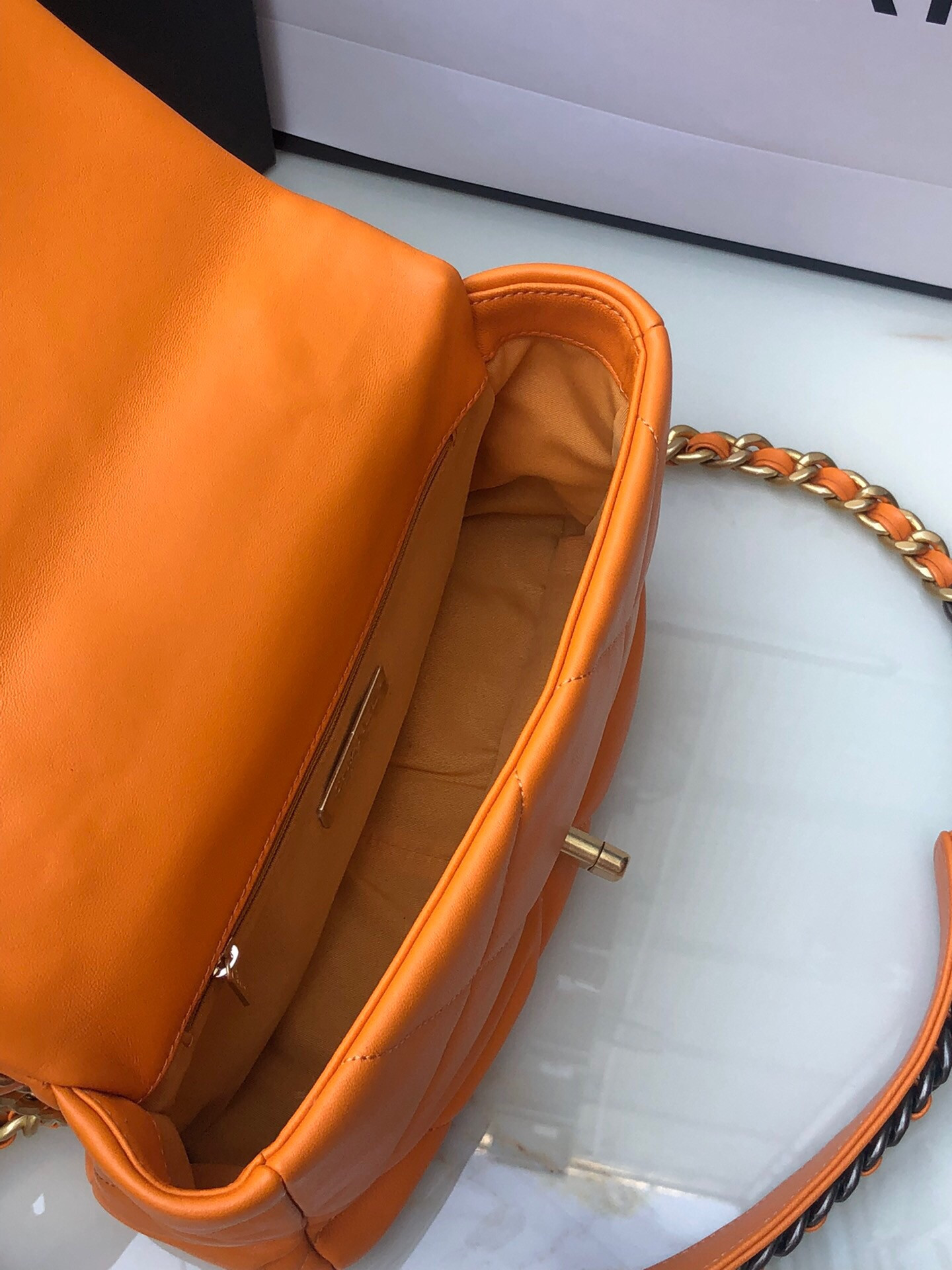 CHANEL 19 HANDBAG Shiny Leather, Gold-Tone, Silver-Tone & Ruthenium-Finish Metal Orange 6.2 × 10.1 × 3.5 in