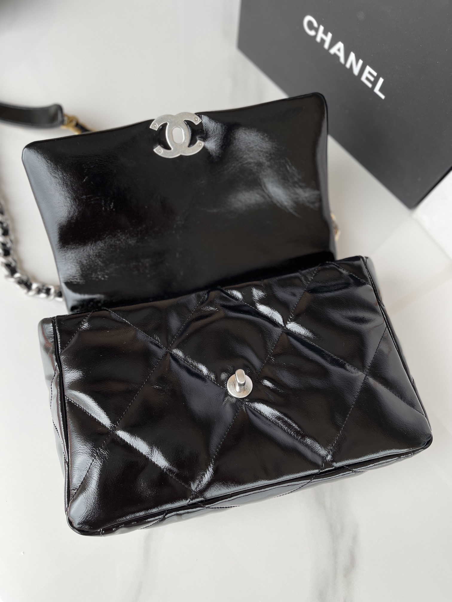 CHANEL 19 LARGE HANDBAG Shiny Leather, Gold-Tone, Silver-Tone & Ruthenium-Finish Metal Black 7.8 × 11.7 × 3.9 in