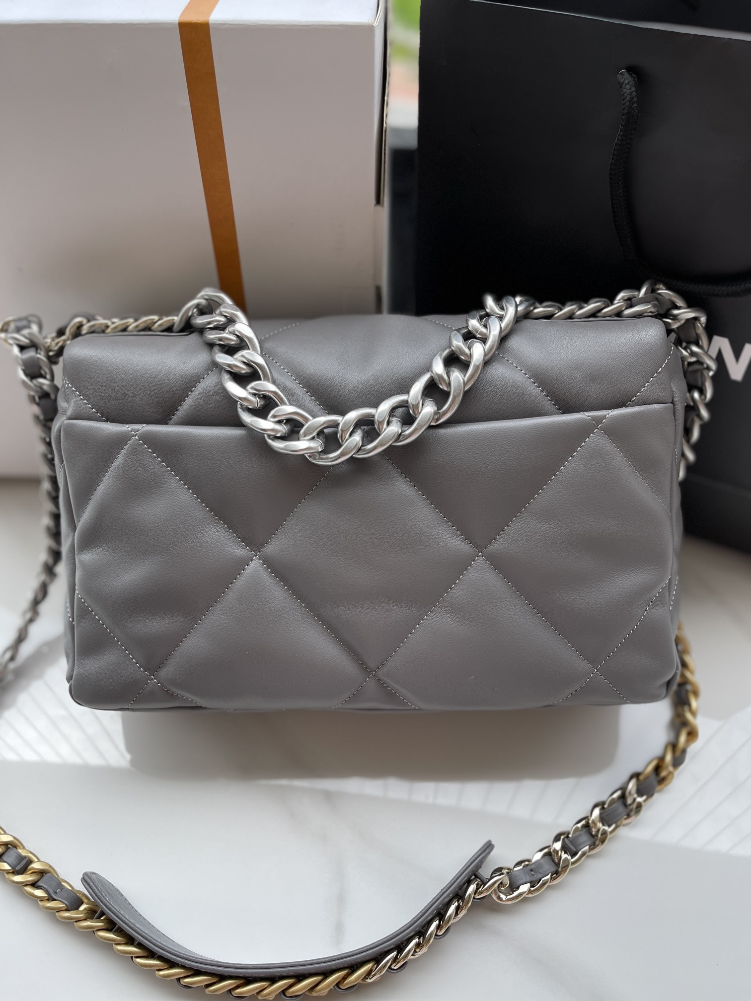 CHANEL 19 LARGE HANDBAG Shiny Leather, Gold-Tone, Silver-Tone & Ruthenium-Finish Metal Gray 7.8 × 11.7 × 3.9 in