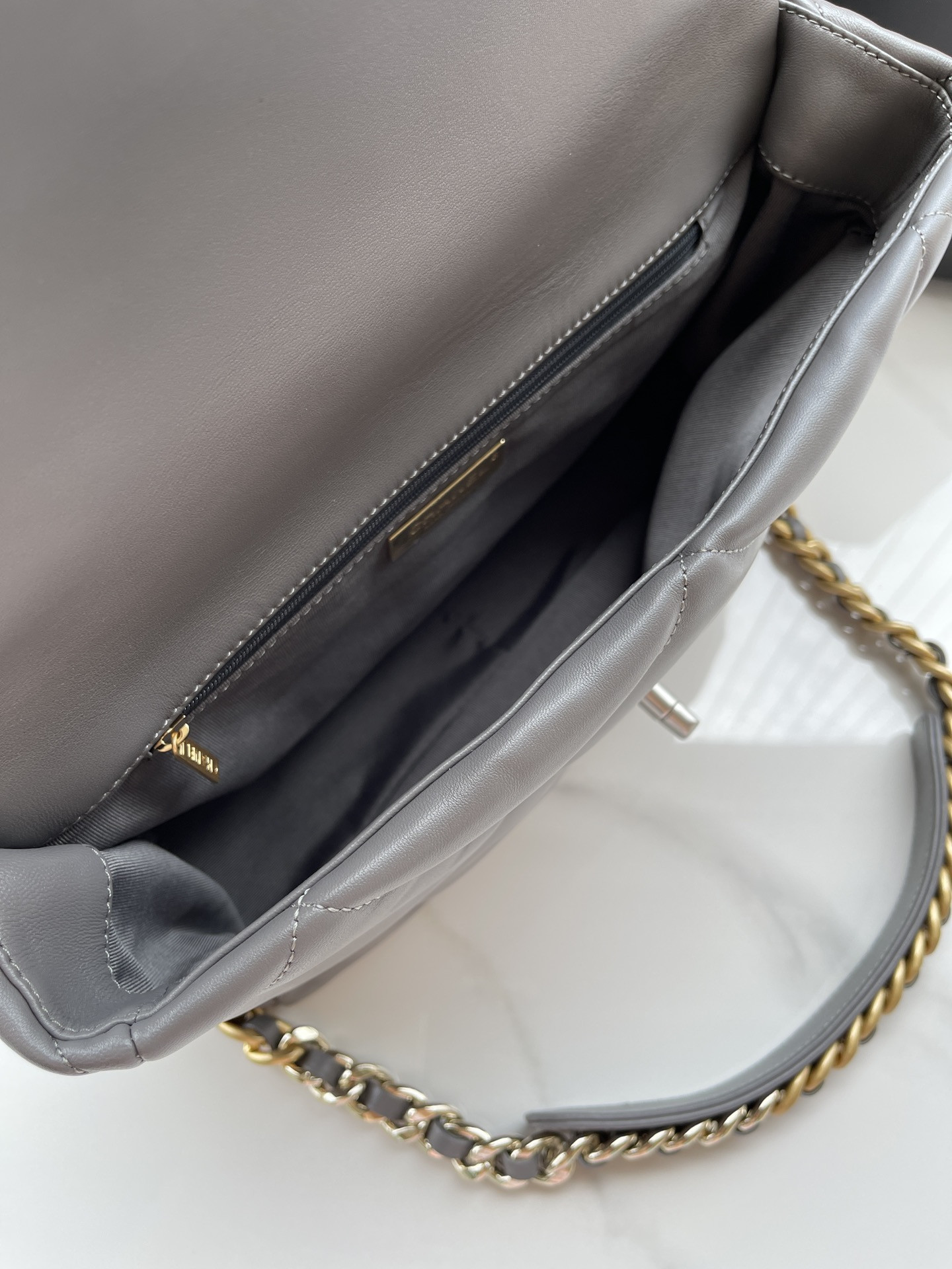 CHANEL 19 LARGE HANDBAG Shiny Leather, Gold-Tone, Silver-Tone & Ruthenium-Finish Metal Gray 7.8 × 11.7 × 3.9 in