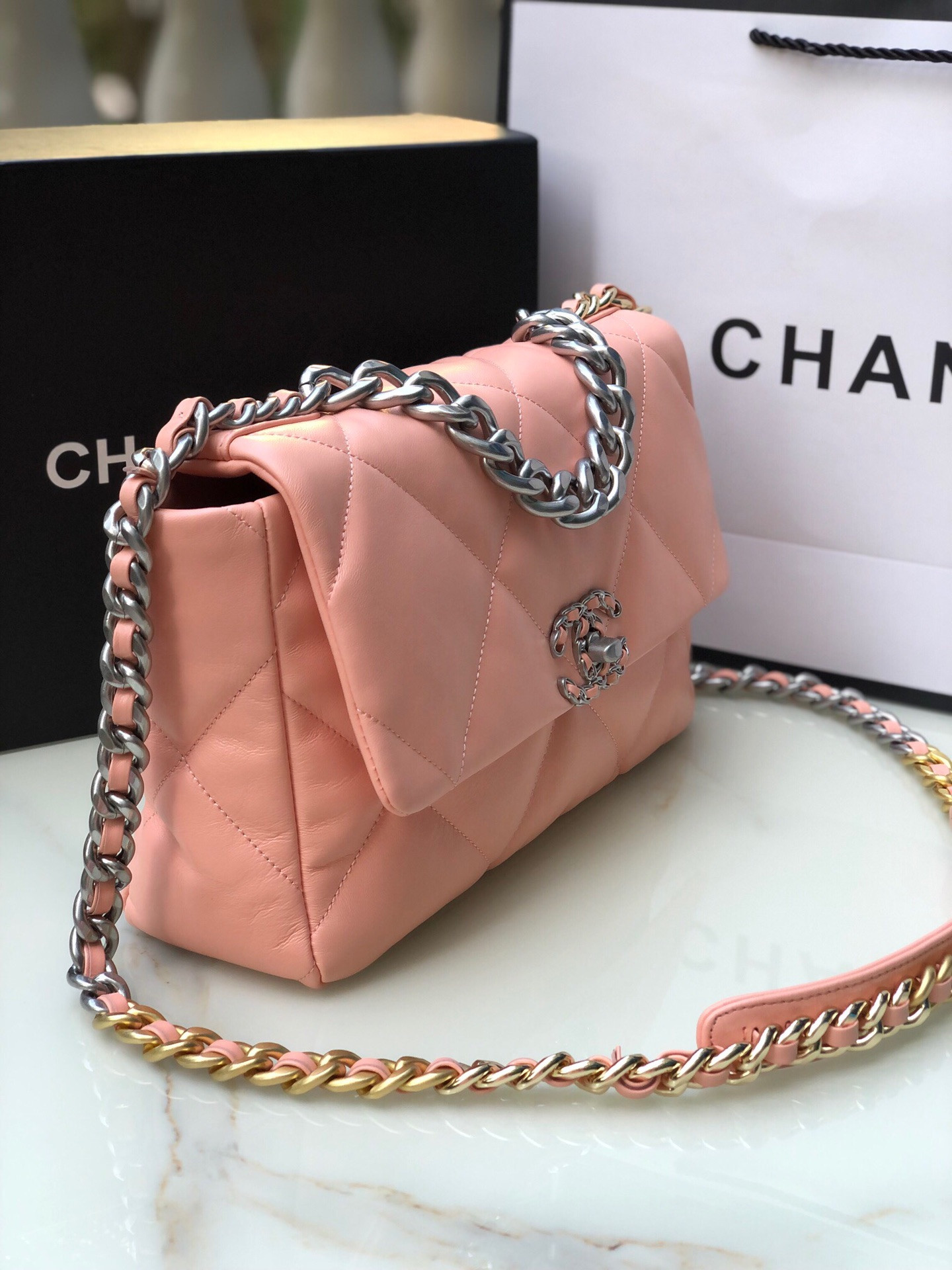 CHANEL 19 LARGE HANDBAG Shiny Leather, Gold-Tone, Silver-Tone & Ruthenium-Finish Metal Light Pink 7.8 × 11.7 × 3.9 in