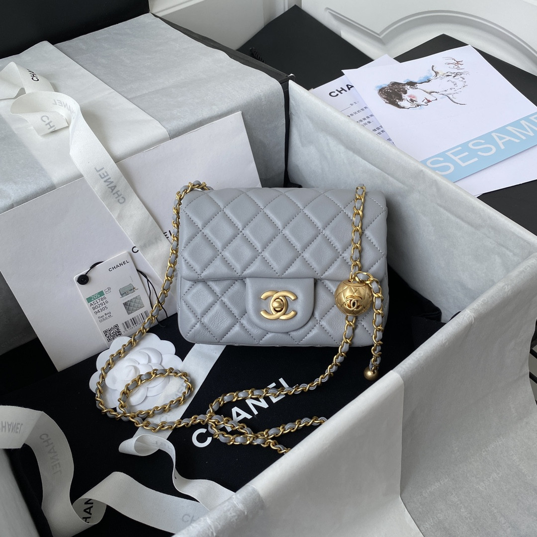 CHANEL MINI FLAP BAG SHINY CALFSKIN & Gold-Tone METAL LIGHT BLUE 5.3 × 6.6 × 3.1 in