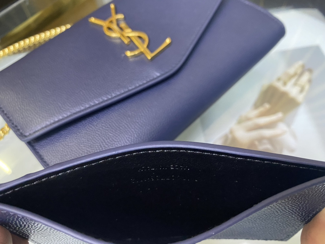 YSL UPTOWN CHAIN WALLET IN GRAIN DE POUDRE EMBOSSED LEATHER NAVY 7.5 X 4.7 X 1.2 INCHES