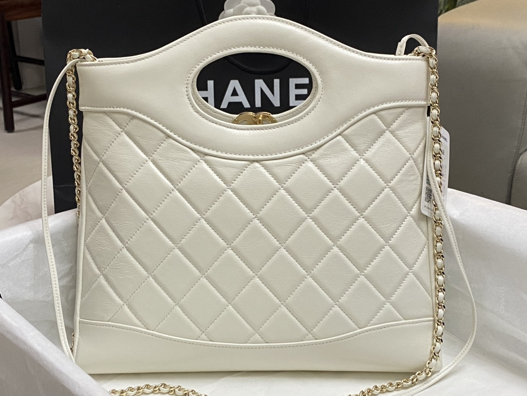 CHANEL SHOPPING BAG Shiny Lambskin & Gold-Tone Metal 11.7 × 11.3 × 3.5 in