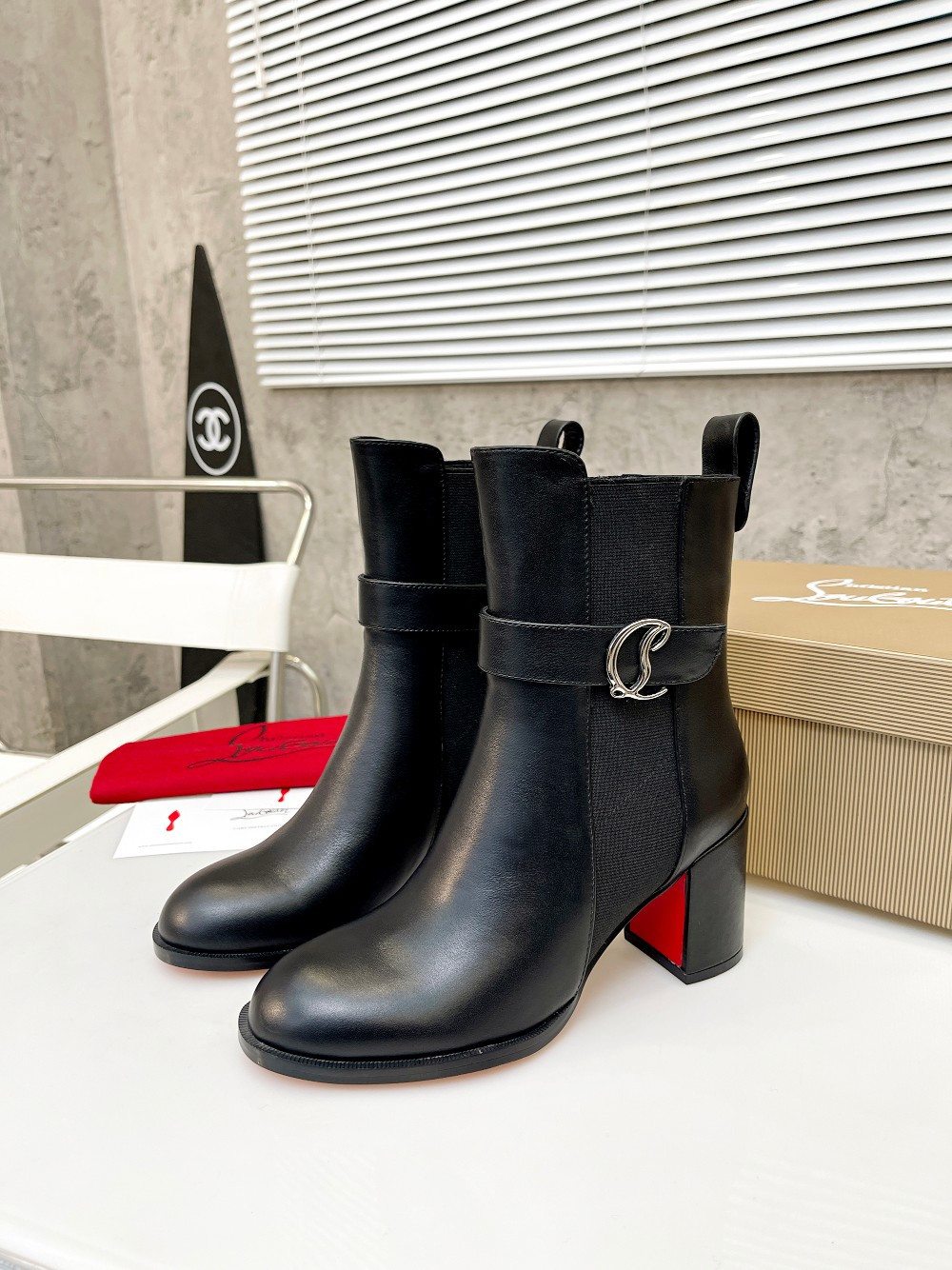 UA Christian Louboutin (CL) launched a new collection of chunky heeled platform boots