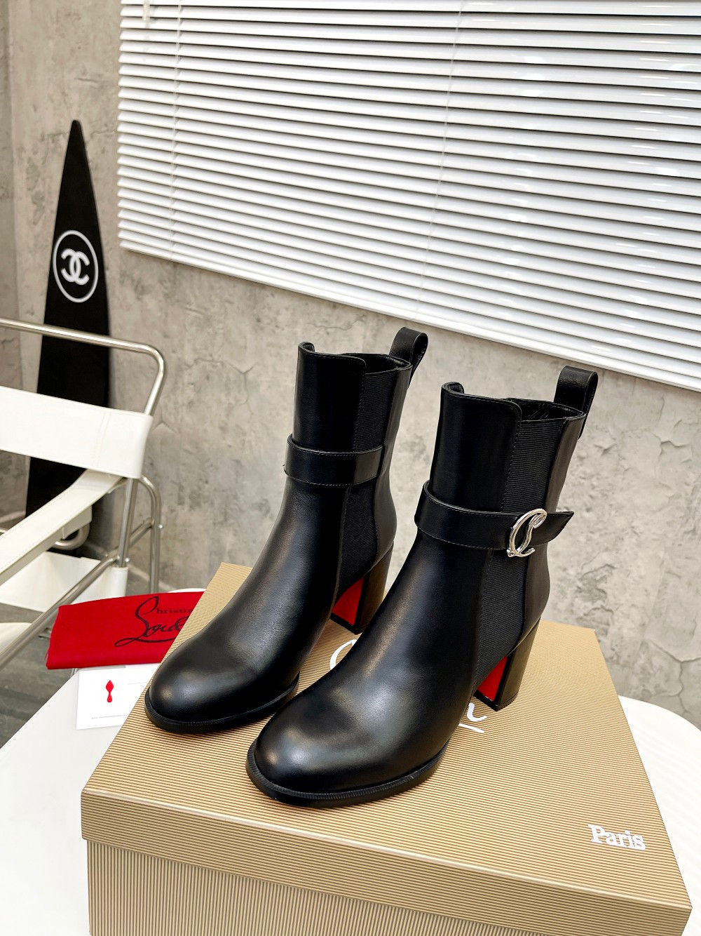 UA Christian Louboutin (CL) launched a new collection of chunky heeled platform boots