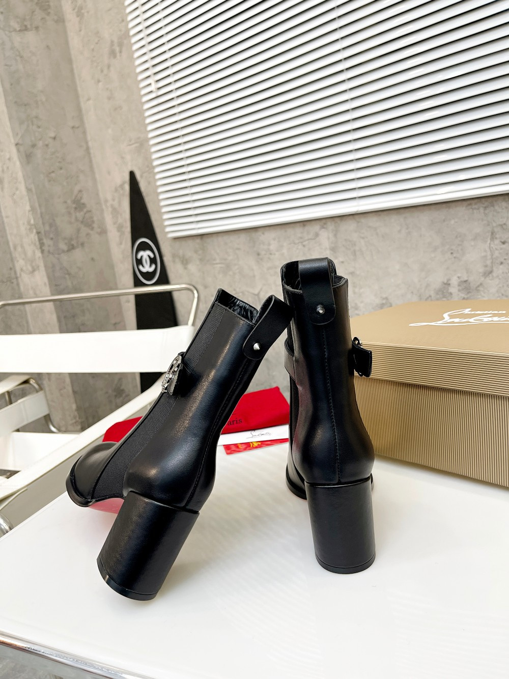 UA Christian Louboutin (CL) launched a new collection of chunky heeled platform boots