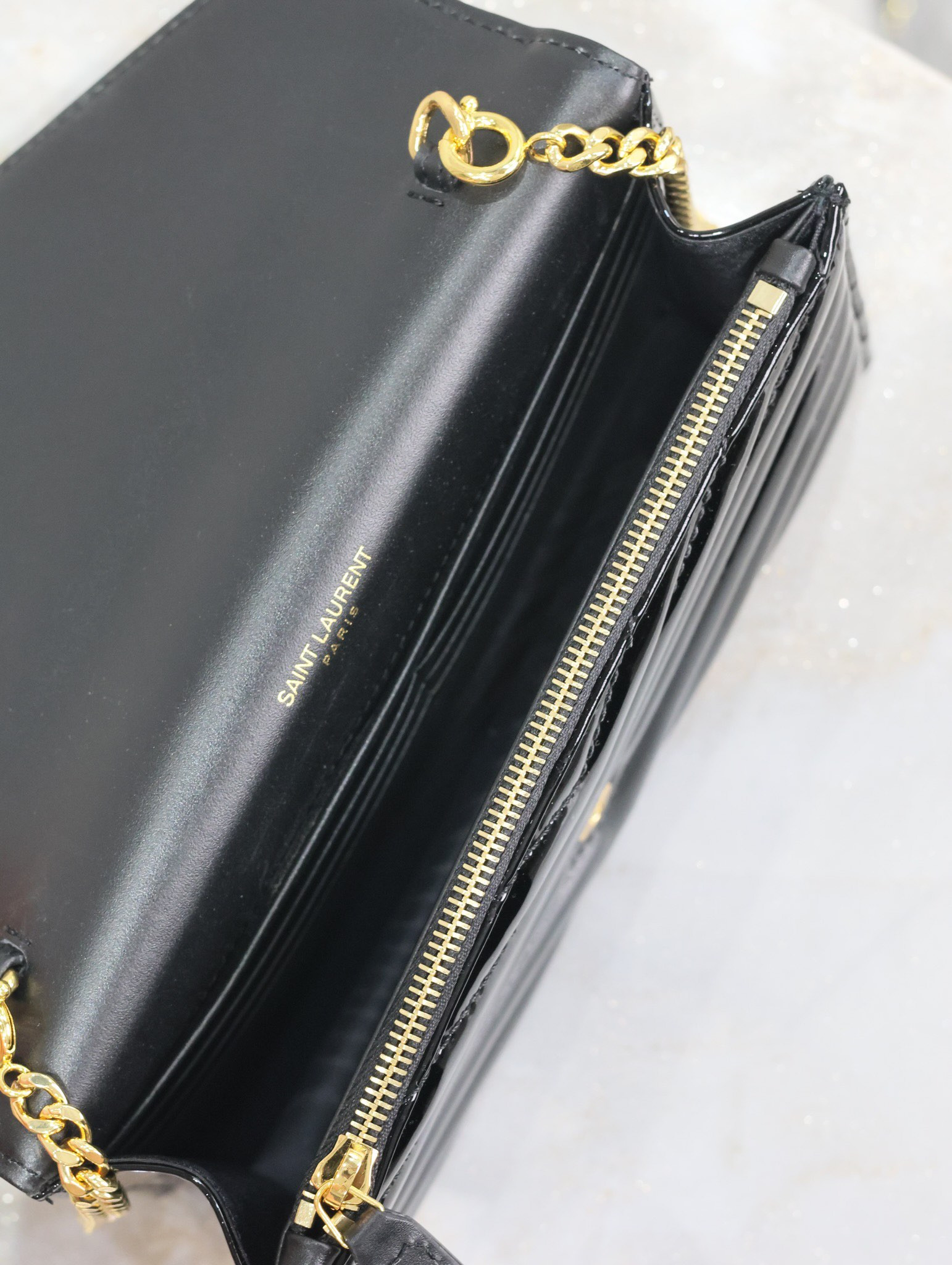 YSL Cassandra WOC envelope chain wallet in patent leather 19 x 12.5 x 3.5cm