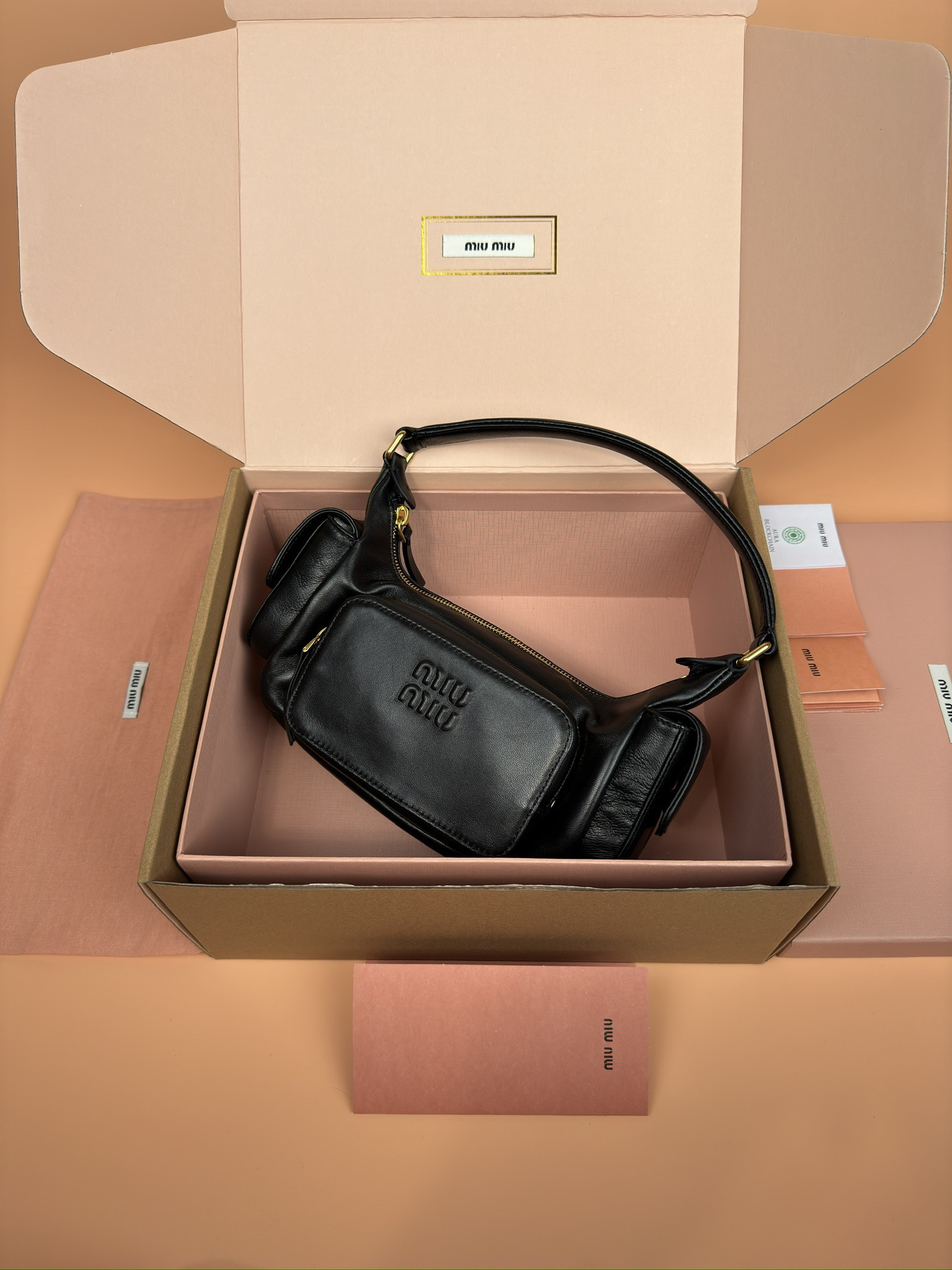 Miu Miu Hobo Nappa leather pocket bag 12x21x6cm