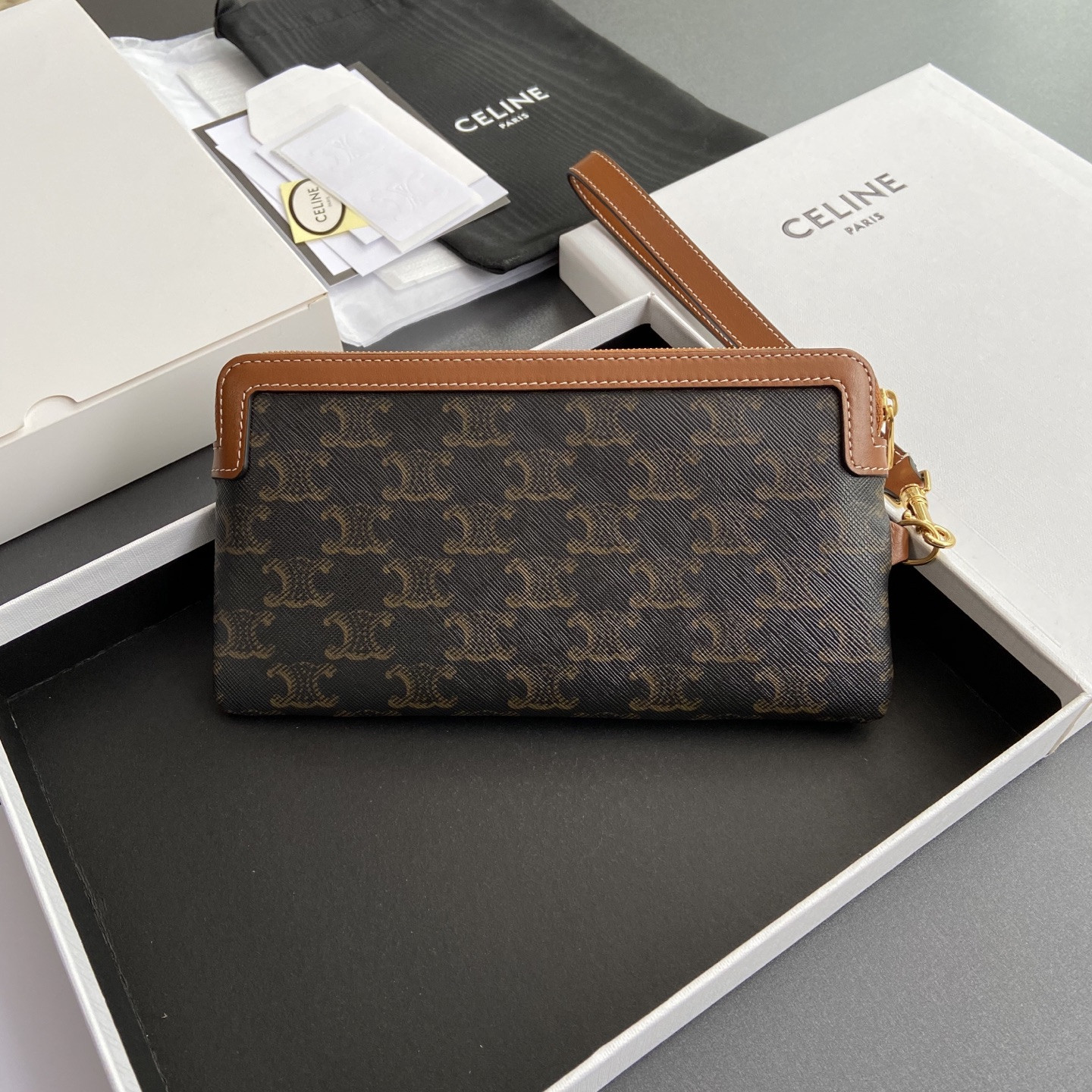 Celine LONG POUCH WITH STRAP in triomphe canvas and calfskin 21.5x11.5x1cm