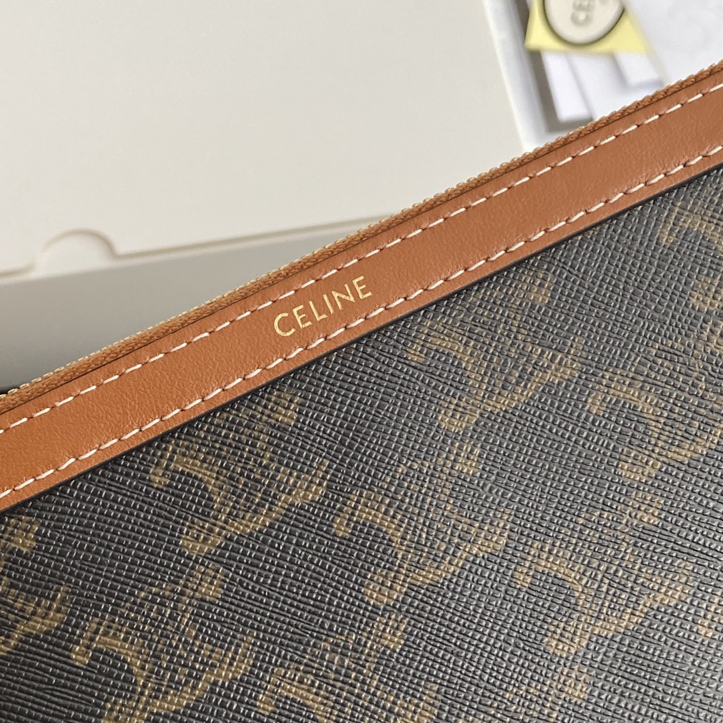 Celine LONG POUCH WITH STRAP in triomphe canvas and calfskin 21.5x11.5x1cm